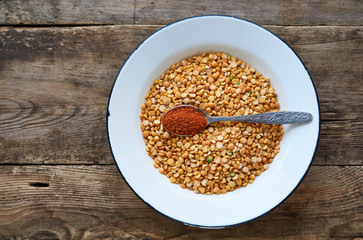 Dry split peas with hot peppers in a bowl 
