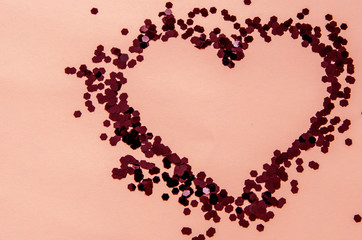 red glitter hearts on a white background for Valentine's Day