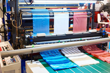 Machine for production of plastic bags