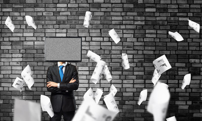 Businessman with TV instead of head.
