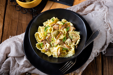 spicy roasted meat with mushroom sauce in the oven