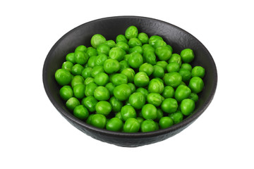 green peas in black bowl isolated on white background
