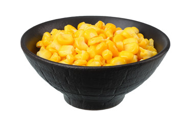 black bowl with canned corn kernels isolated on white background