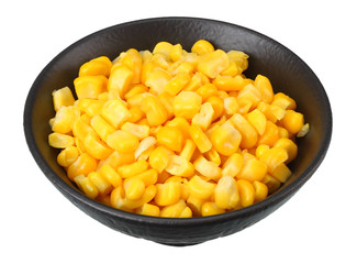 black bowl with canned corn kernels isolated on white background