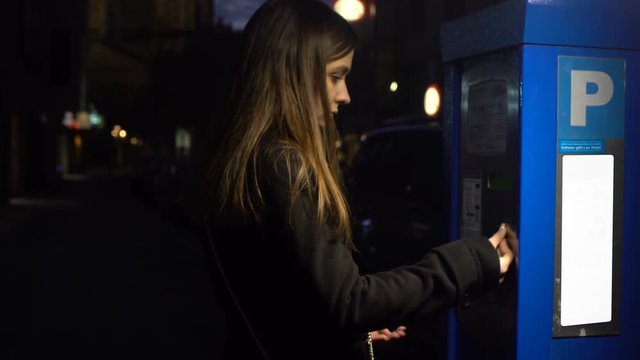Lady putting coins in parking meter, walking to car, transportation service
