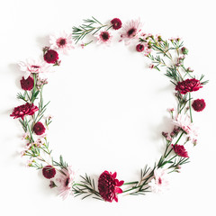 Flowers composition. Wreath made of red flowers on white background. Flat lay, top view, copy space, square