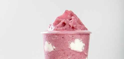 Ice strawberry flavored milkshake