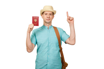 The man with the Russian international passport in summer clothes points a finger up