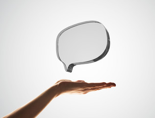 Concept of communication by glass empty chat icon on gray background