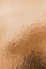 Copper foil shiny wrapping paper texture background for wall paper decoration element.