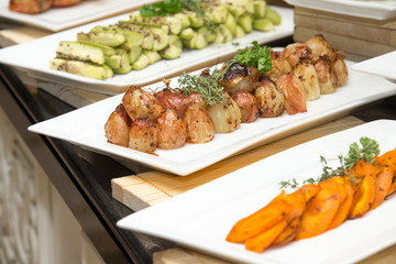 tray of assorted food for salad buffet