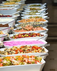 tray of assorted food for salad buffet