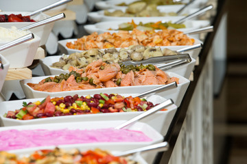 tray of assorted food for salad buffet