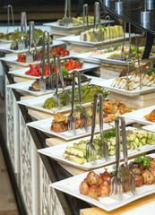 tray of assorted food for salad buffet