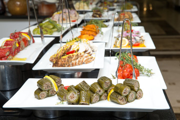 tray of assorted food for salad buffet