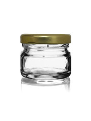 empty glass jar closed by a metal cover with reflection on a white background