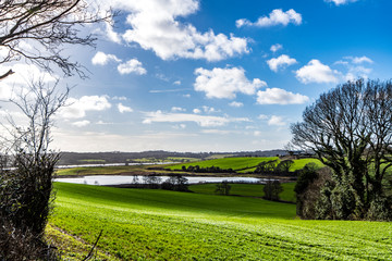 View of the winter flooded Combe Valley and Crowhurst Lake in East Sussex, England