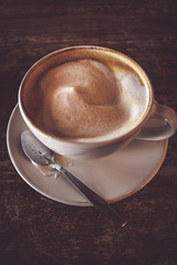 cup of coffee on black background