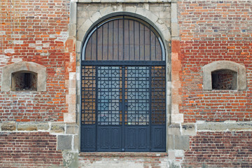 unique doors of the old historic church city Drohobych, Ukraine. historic arched gates of the old church