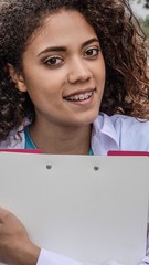 Female Nurse With Clipboard