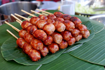 Grilled Pork and Rice Sausage on Wooden Sticks at the Walking Street Market