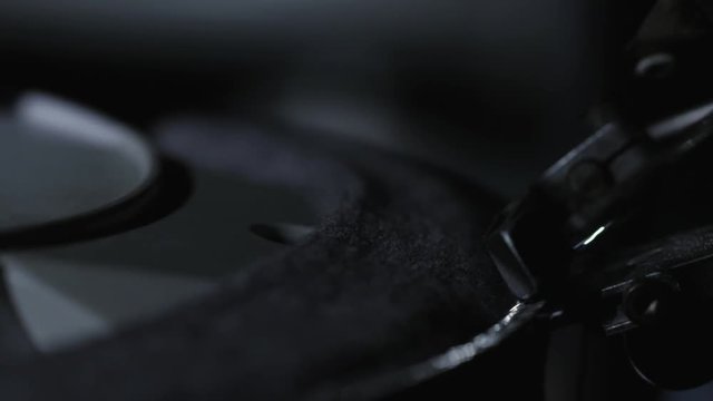 Action shot of an isolated sewing machine.