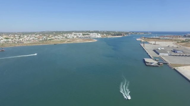 Aerial drone shot of a speadboat.