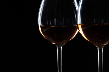 Glasses of wine in darkness