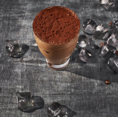Chocolate frappe coffee outside on a summer day