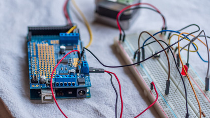 Microcontroller build closeup showing components, board and shield