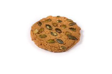 Fresh baked oatmeal cookie on a white
