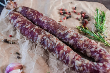 Homemade smoked sausage in a natural casing. Farm products concept.