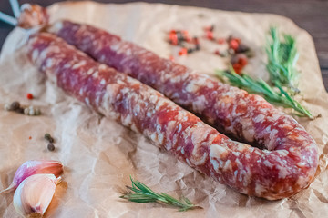 Homemade smoked sausage in a natural casing. Farm products concept.