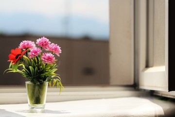flowers in a vase on table