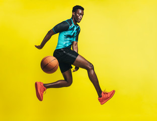 Fototapeta na wymiar Basketball player in action