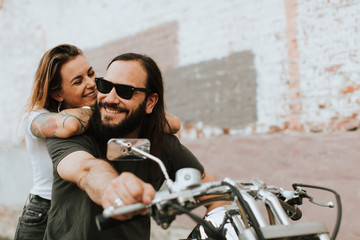 Portrait of a cool biker couple