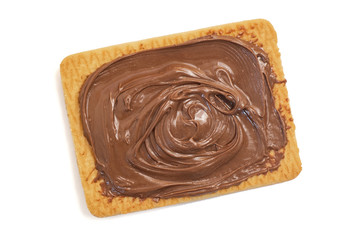 Chocolate hazelnut cream on cookie isolated on white background. Top view. Close Up