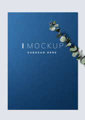 Poster mockup with eucalyptus leaves