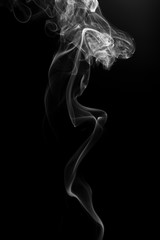 Movement of white smoke on black background