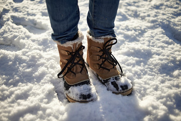 Snowboots in the snow in winter