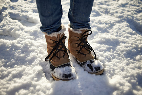 Snowboots in the snow in winter