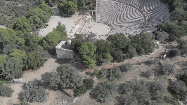 Moving away from the side of the ancient theater of Epidavros in Greece. Clear sky, sunny weather, flat colour profile.