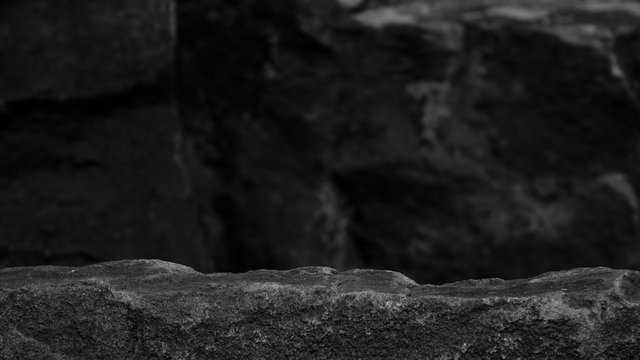 A Foreground Rock Shelf For A Product Display, Showing The Hard Texture Of The Mineral On A Stone Blurred Background.