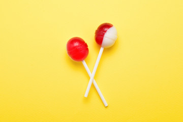 Lollipop on a yellow background. Space for text or design.