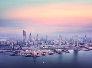 Twilight, beautiful Kuwait city skyline taken by drone 