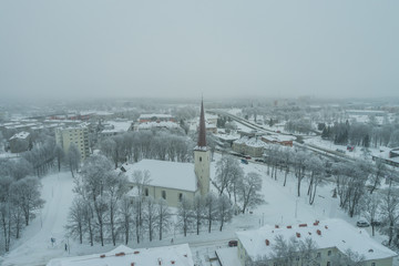 Obraz premium Aerial view of the city on a cold winter day. Sunset on a winter day.