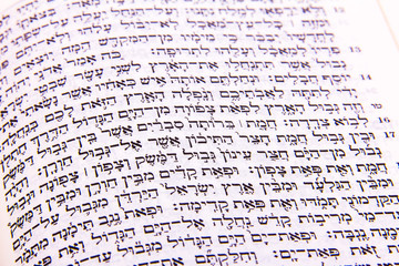 Opened hebrew Bible, isolated on white background