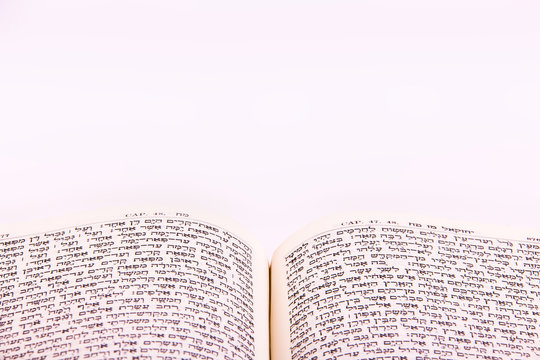 Opened hebrew Bible, isolated on white background