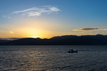 Naklejka na ściany i meble Sunset sky over the Mediterranean Sea