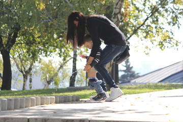 Children pissing on the path of the green nature park